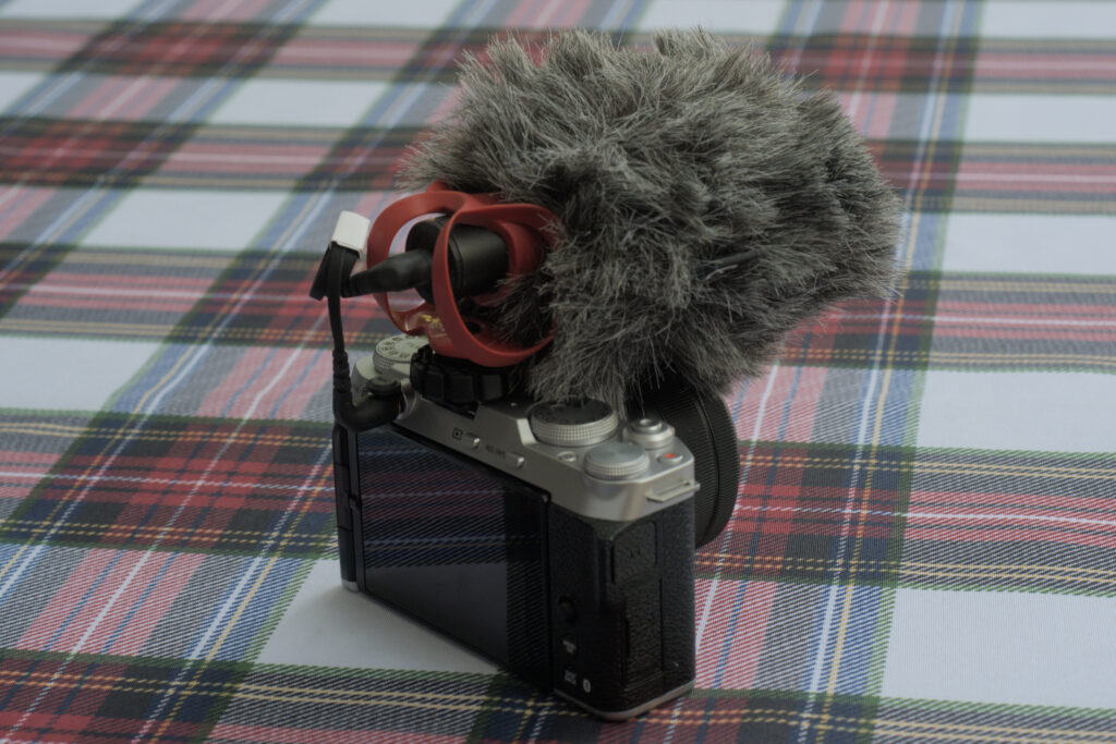 The Røde Video Micro II with a deadcat wind screen mounted on the Fujifilm X-M5